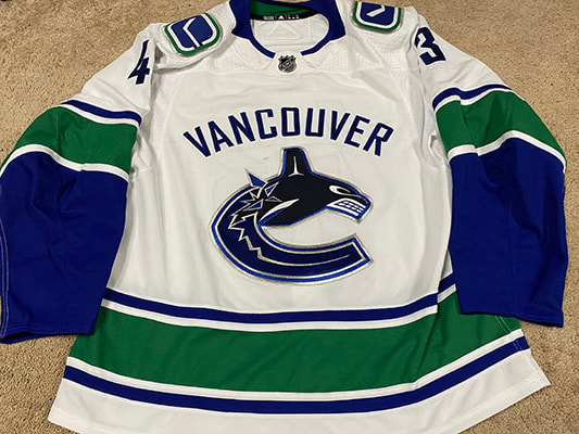 Quinn Hughes Canucks Away 2021 North Division Patch White Jersey in 2023